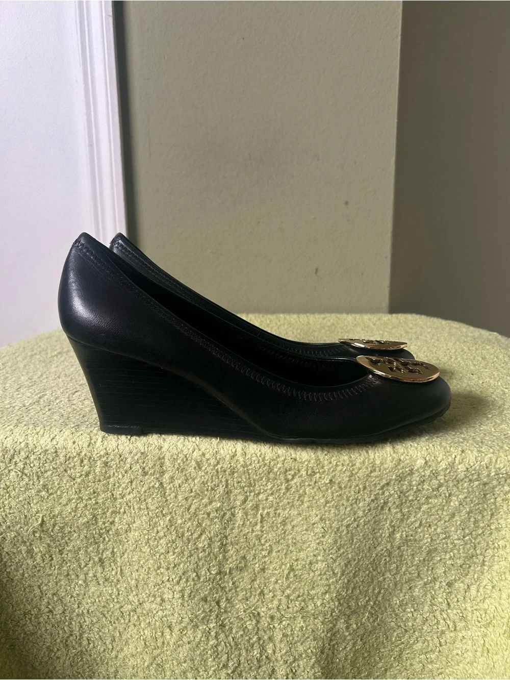 Tory Burch Black Leather Logo Round-Toe Wedge Heels with Gold Emblem